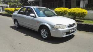 Mazda 323 annee 99 - Family Cars on Aster Vender