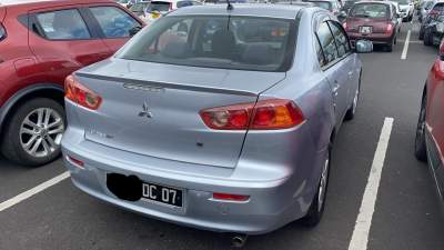 mitsubishi lancer  - Family Cars