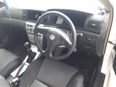 Toyota Corolla NZE  02 - Luxury Cars