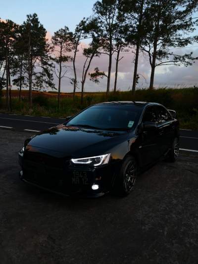 Mitsubishi Lancer Ex - Year 2012 - Evo 10 Body kit - Sport Cars on Aster Vender