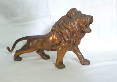Lion en cuivre - Old stuff on Aster Vender