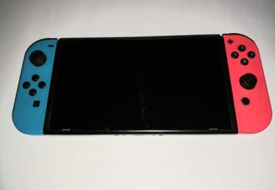 Nintendo switch + all accessories + all games - Nintendo Switch