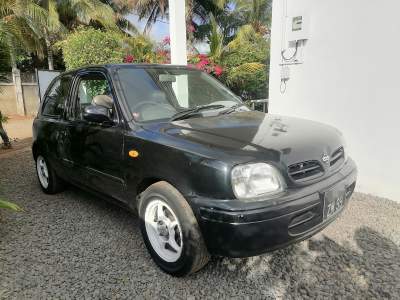 Nissan March AK 11 - Compact cars on Aster Vender