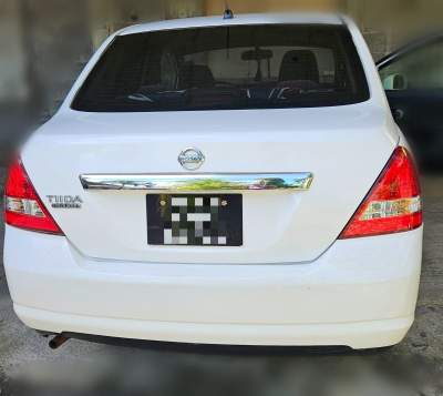 Nissan Tida Year 2004 - Family Cars on Aster Vender