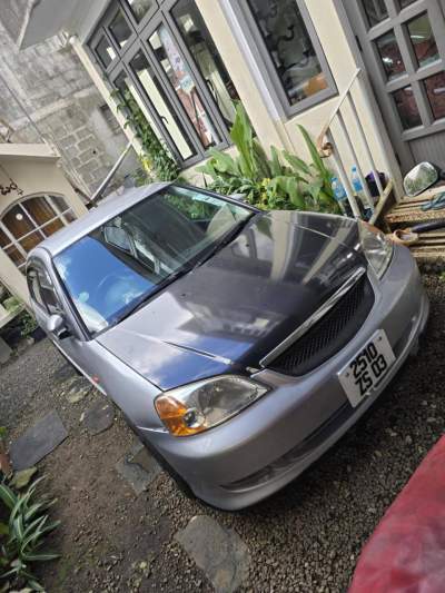 Honda Civic ES8 2003 - Family Cars