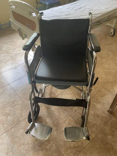 Wheelchair comode - Wheelchair