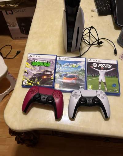Ps5 slim 1tb 2 controllers and 3 games - All electronics products