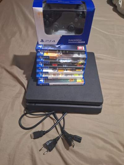 USED 1TB PS4 SLIM WITH CONTROLLER AND 7 FREE GAMES - PlayStation 4 Games