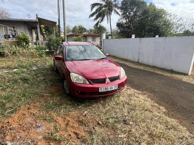 Mitsubishi lancer a vendre - Family Cars