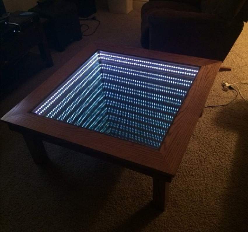 Infinity lights wooden table on Aster Vender