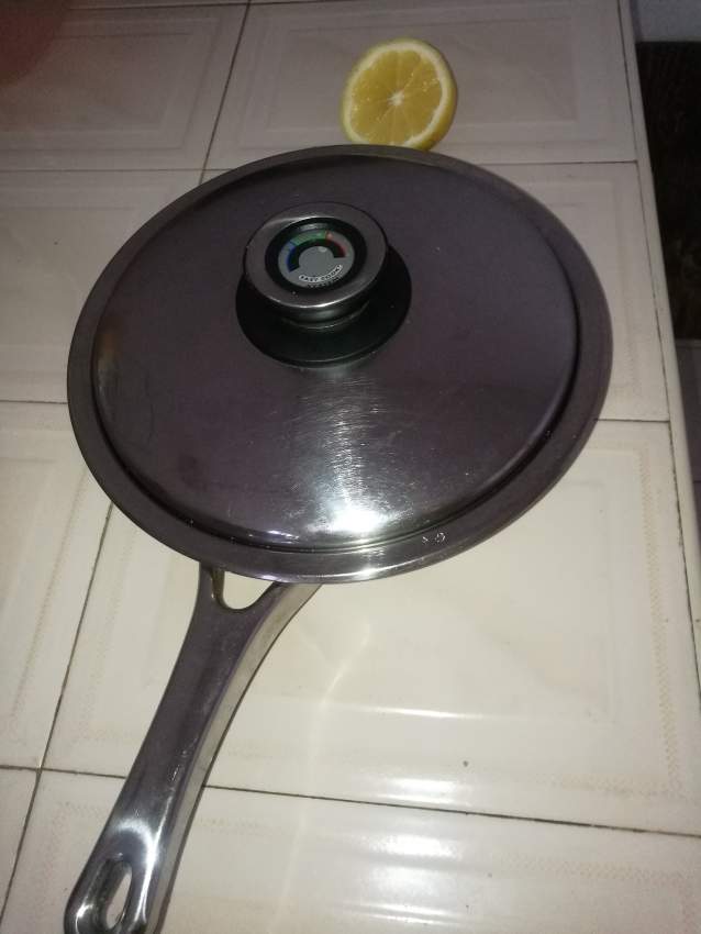 Stainless steel pan on Aster Vender