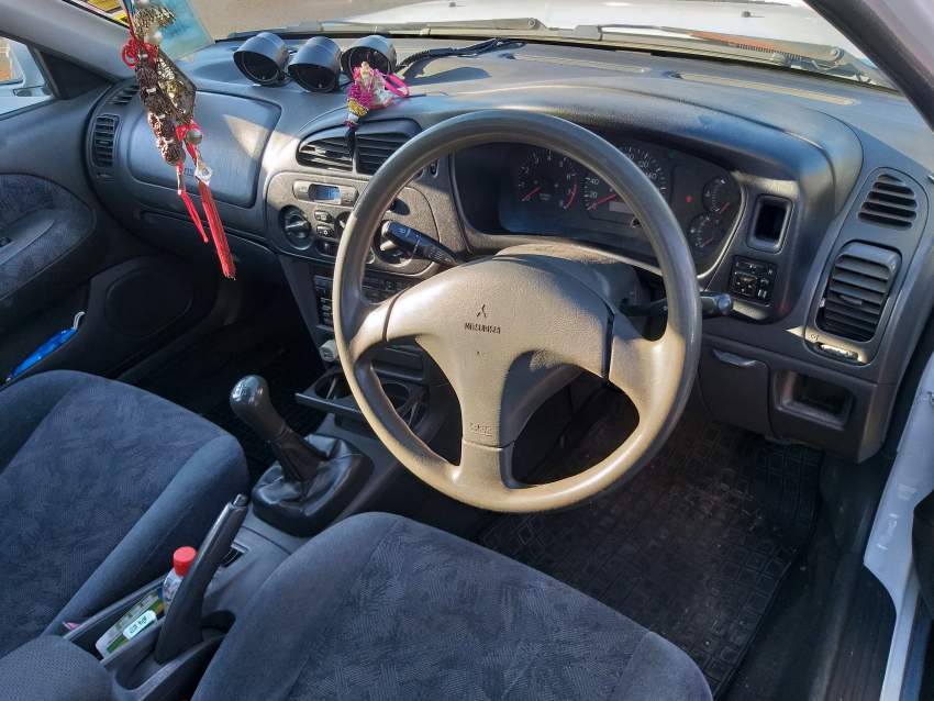 Mitsubishi Lancer Year 1998 - 3 - Compact cars  on Aster Vender