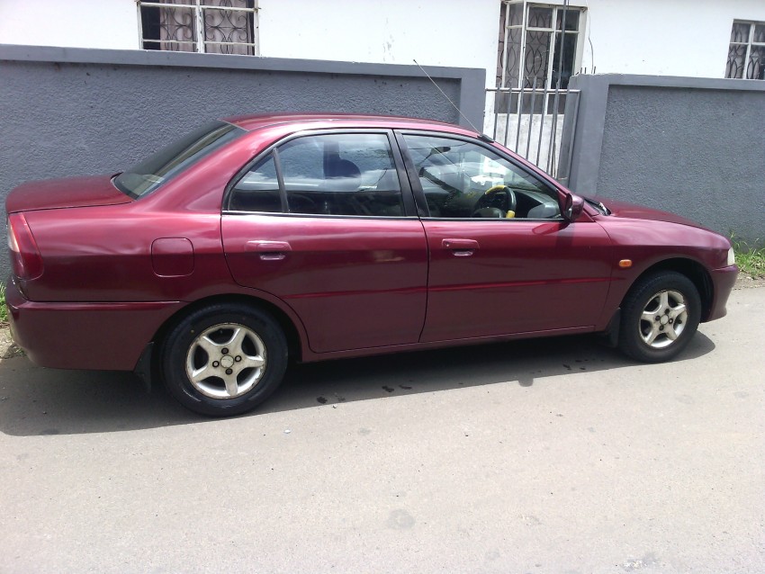 Mitsubishi lancer annee 99 - 0 - Family Cars  on Aster Vender