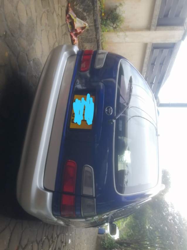 Toyota Corolla Touring AE101 - 1 - Family Cars  on Aster Vender