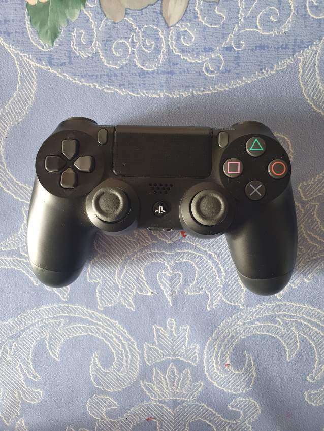 PS4 Slim - 1 - PlayStation 4 (PS4)  on Aster Vender
