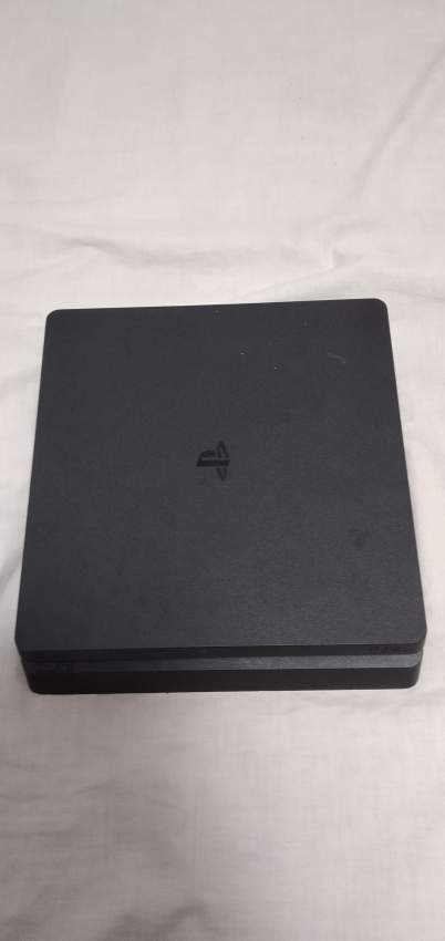 Ps4 slim 1tb+manette militaire+1 game unchated 4  - 5 - PlayStation 4 (PS4)  on Aster Vender