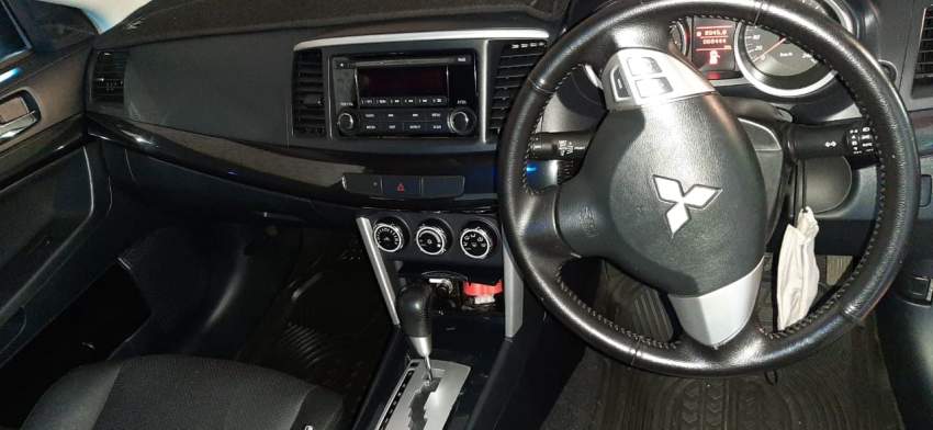 Mitsubishi Lancer EX 2016 - 3 - Sport Cars  on Aster Vender