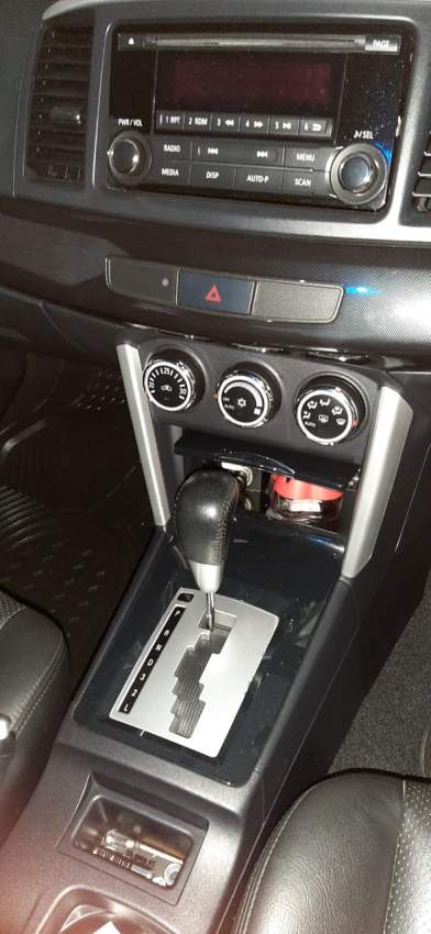 Mitsubishi Lancer EX 2016 - 2 - Sport Cars  on Aster Vender