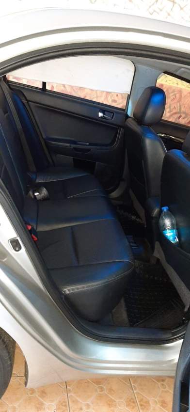 Mitsubishi Lancer EX 2016 - 4 - Sport Cars  on Aster Vender