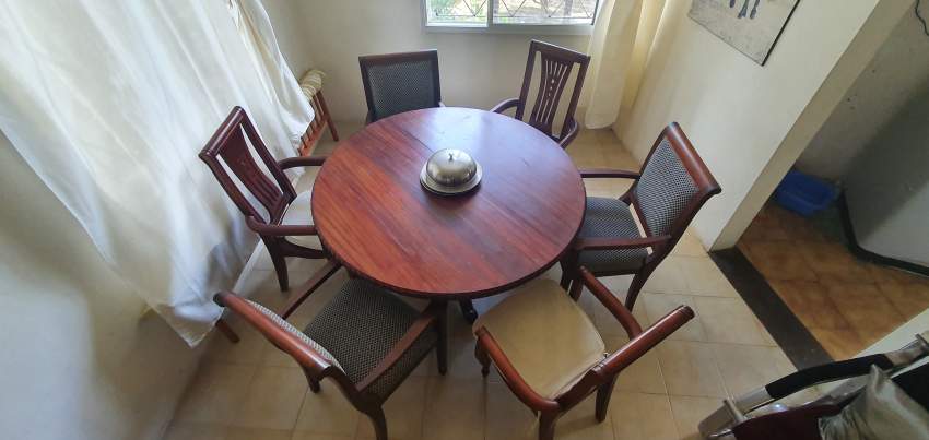 Dining Table + 7 chairs on Aster Vender