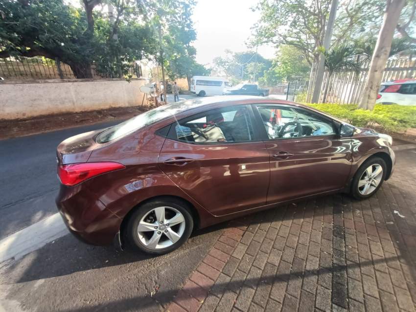 Hyundai Elantra year 2013 metallic brown - 2 - Family Cars  on Aster Vender