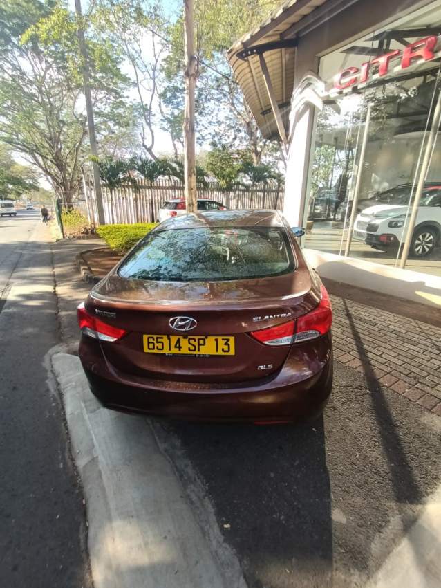 Hyundai Elantra year 2013 metallic brown - 4 - Family Cars  on Aster Vender