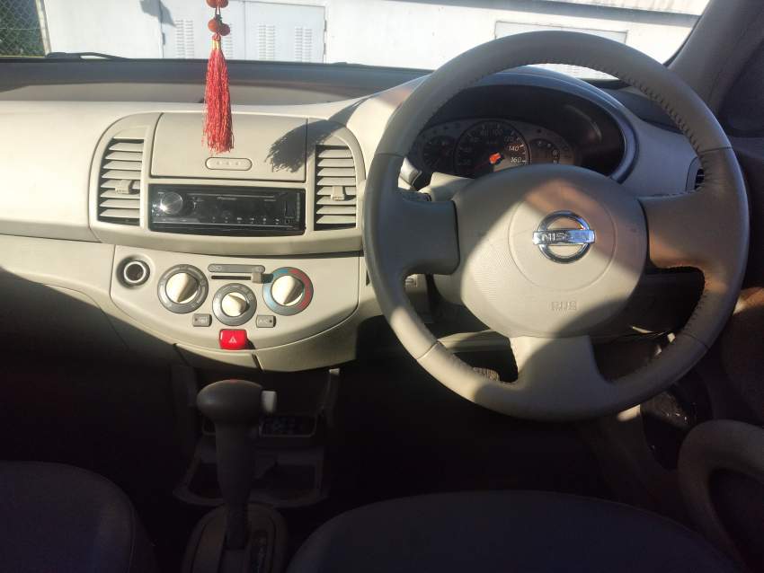 A vendre nissan ak12 automatic 2005 on Aster Vender