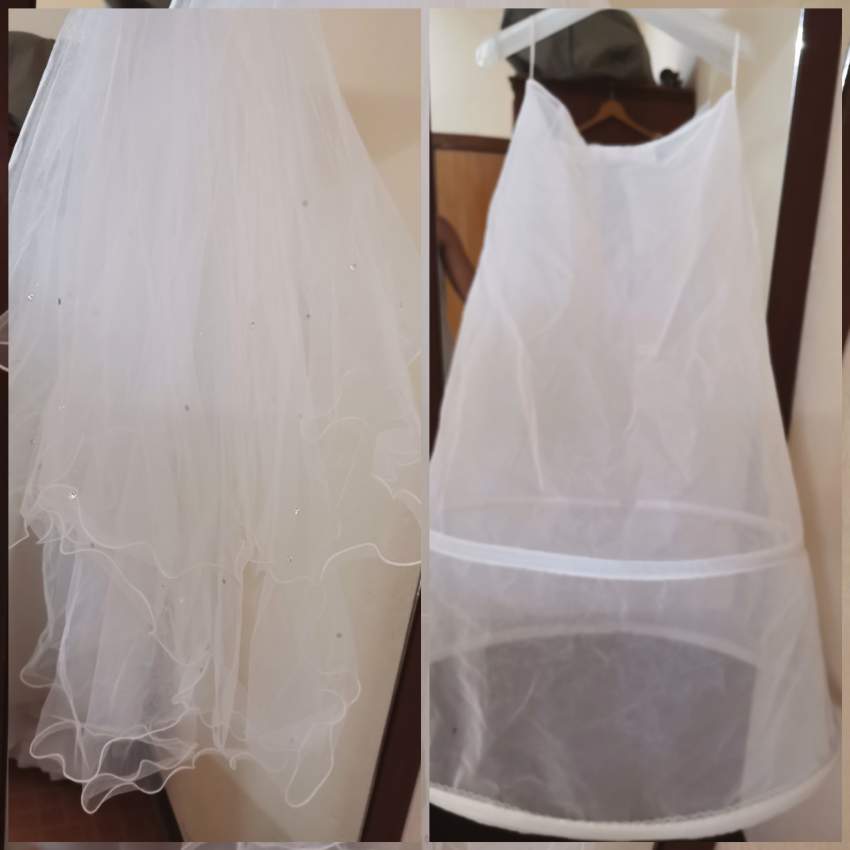 Second hand Wedding dress  - 1 - Wedding clothes  on Aster Vender