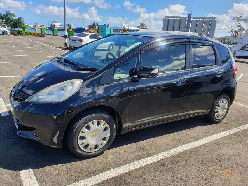 Honda Fit 2013 - 1 - Family Cars  on Aster Vender