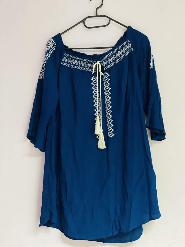 Blue Off Shoulder Top on Aster Vender