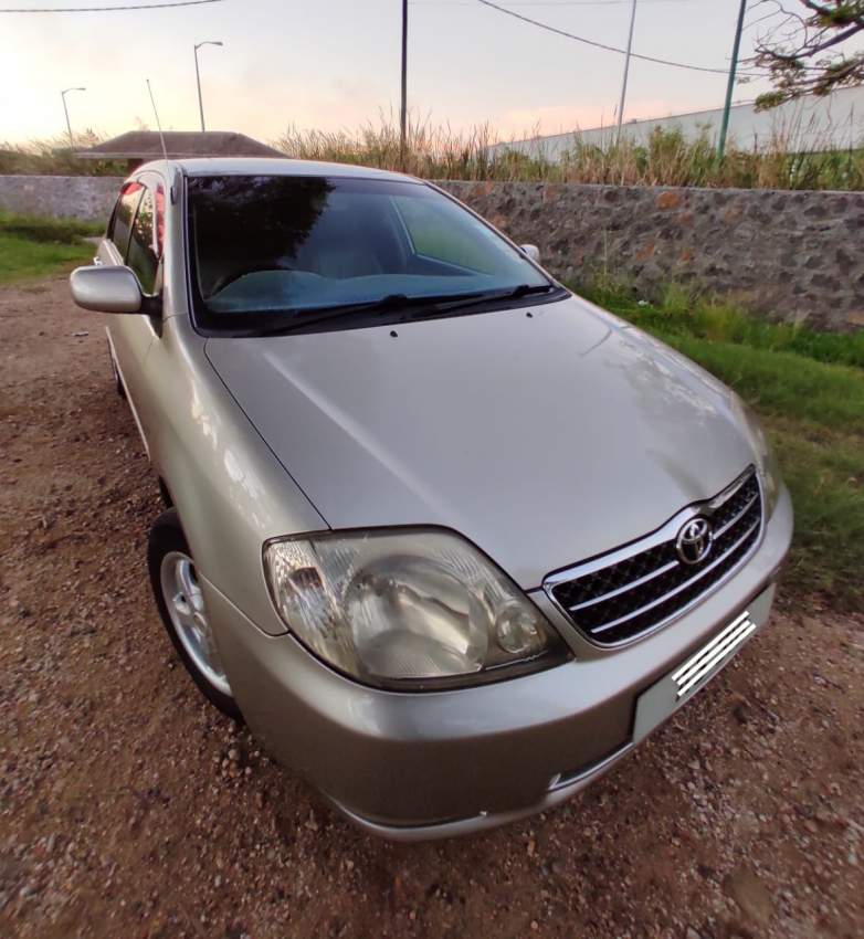 Toyota Corolla NZE 121 - 2 - Family Cars  on Aster Vender