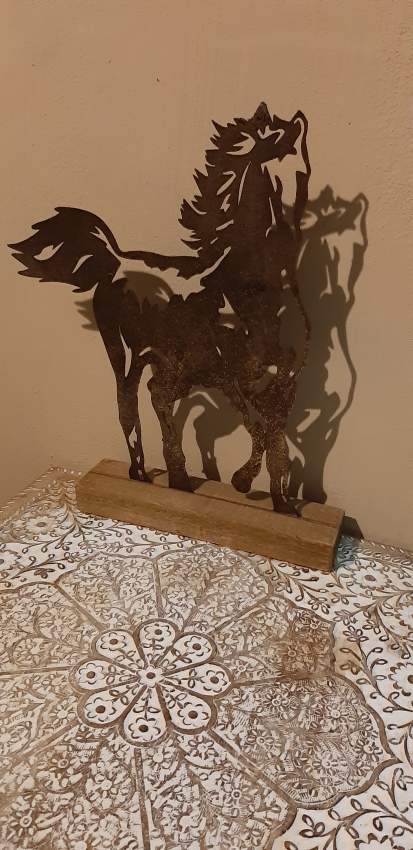 Metal Corse figurine on Aster Vender