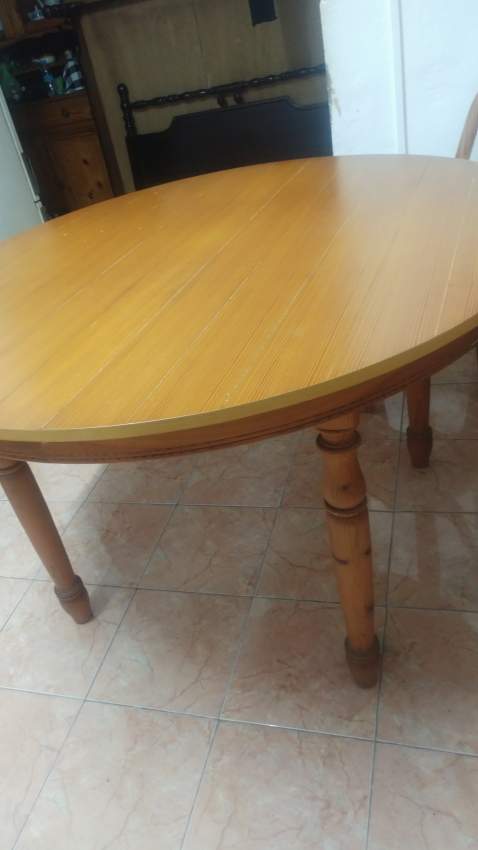Treated pine wood dining table on Aster Vender