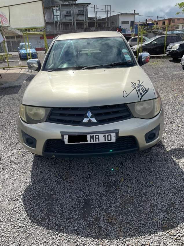 2x4 Mitsubishi L200 Sportero Year 10 - 5 - Pickup trucks (4x4 & 4x2)  on Aster Vender