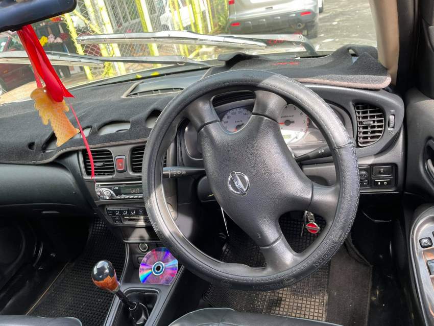 Nissan Sunny Year 04 - 2 - Family Cars  on Aster Vender