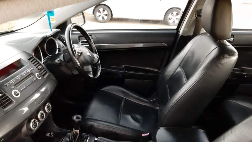 Mitsubishi Lancer EX  - 1 - Family Cars  on Aster Vender