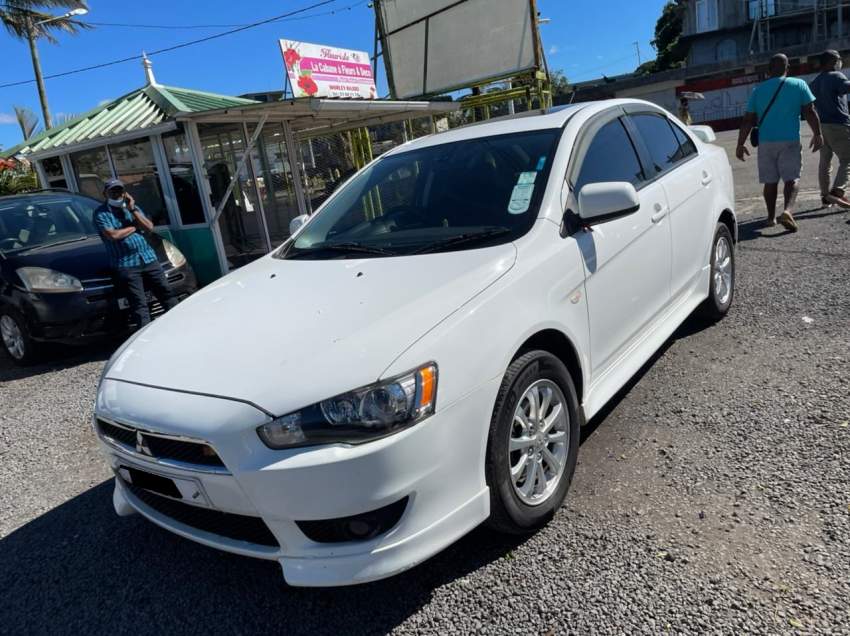 Mitsubishi Lancer EX Year 2013  - 3 - Sport Cars  on Aster Vender