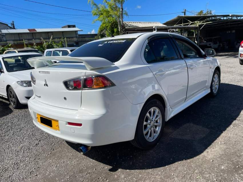 Mitsubishi Lancer EX Year 2013  - 5 - Sport Cars  on Aster Vender