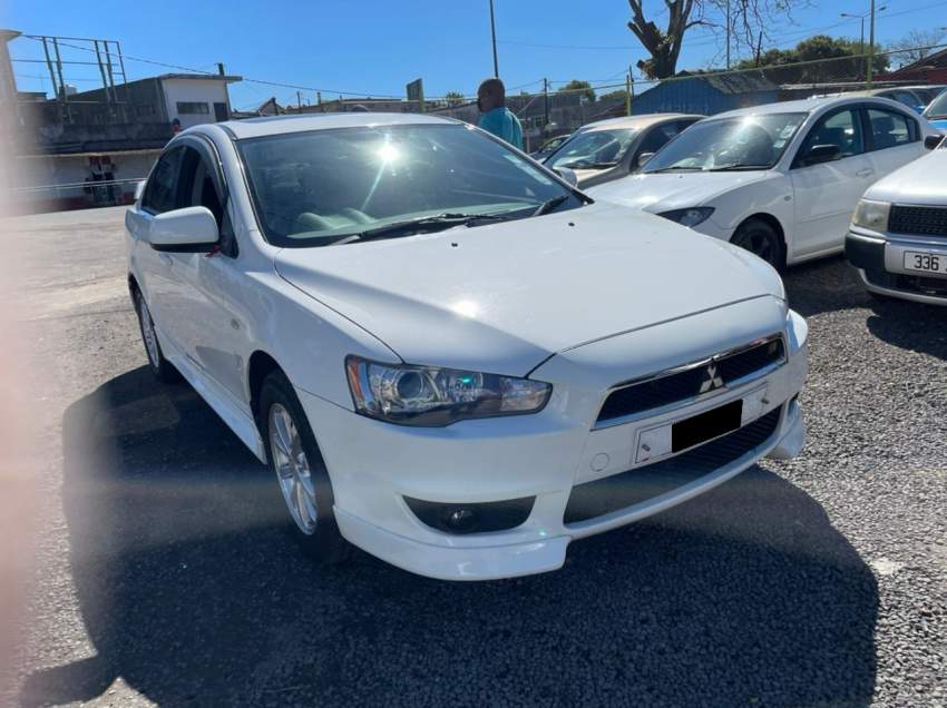 Mitsubishi Lancer EX Year 2013  - 4 - Sport Cars  on Aster Vender