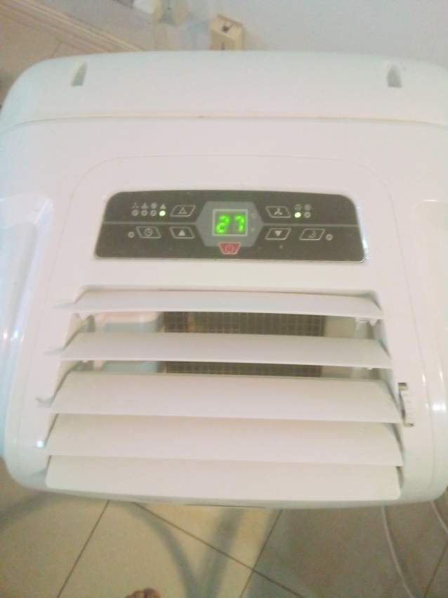 PORTABLE AIR CONDITIONER 12000 BTU  - 1 - All household appliances  on Aster Vender