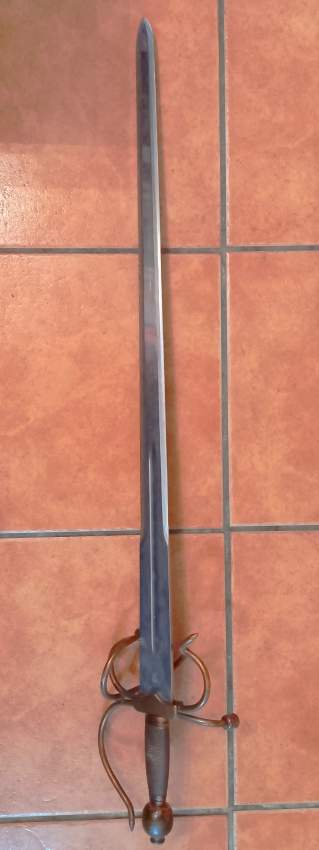 Old antique heavy steel sword for home deco or collection on Aster Vender