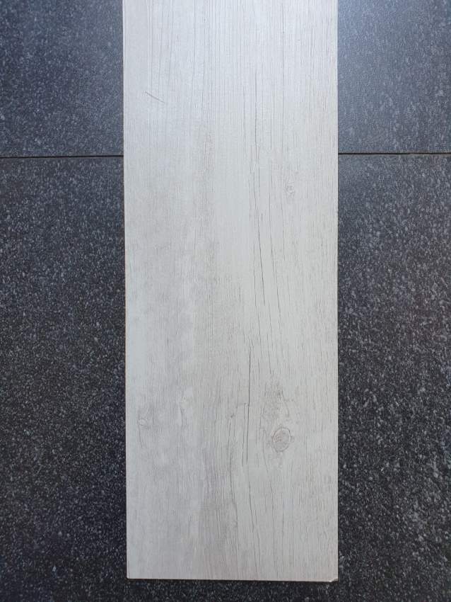 New LVT flooring tiles on Aster Vender