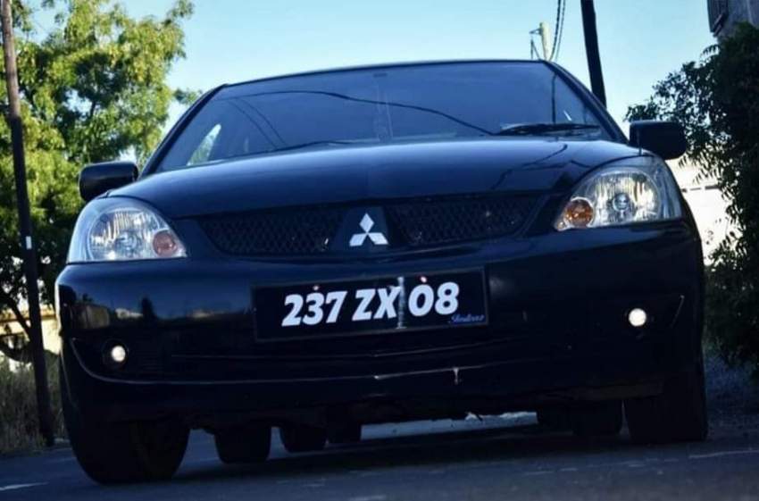 A Vendre Mitsubishi Lancer  tou bon ladan nek prnd roule - 9 - Sport Cars  on Aster Vender