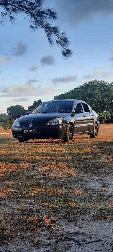 A Vendre Mitsubishi Lancer  tou bon ladan nek prnd roule - 0 - Sport Cars  on Aster Vender