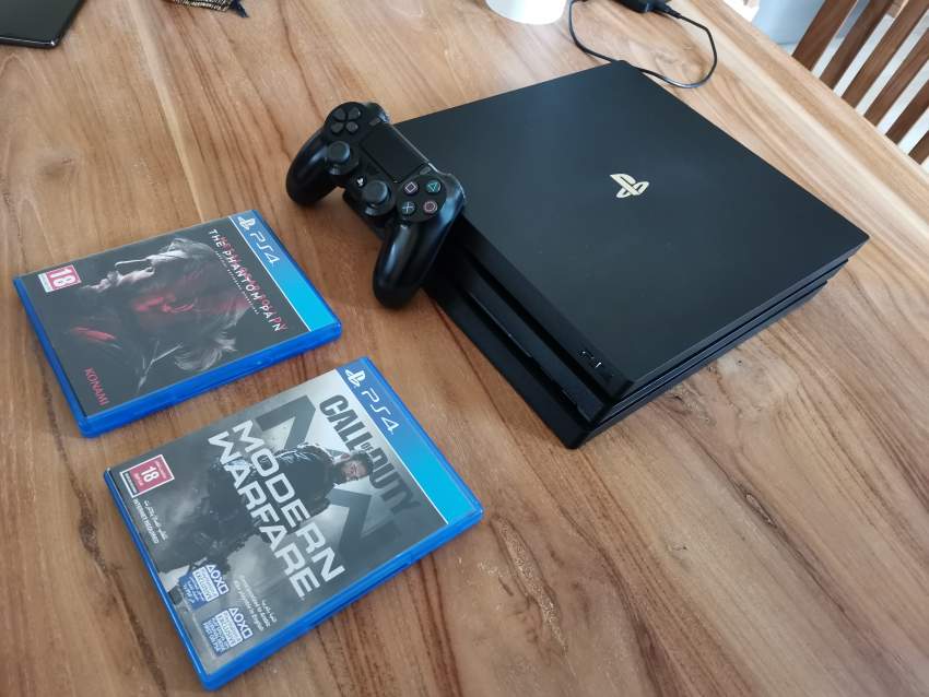 PS4 PRO - 1 TB - 2 GAMES - PlayStation 4 (PS4) on Aster Vender