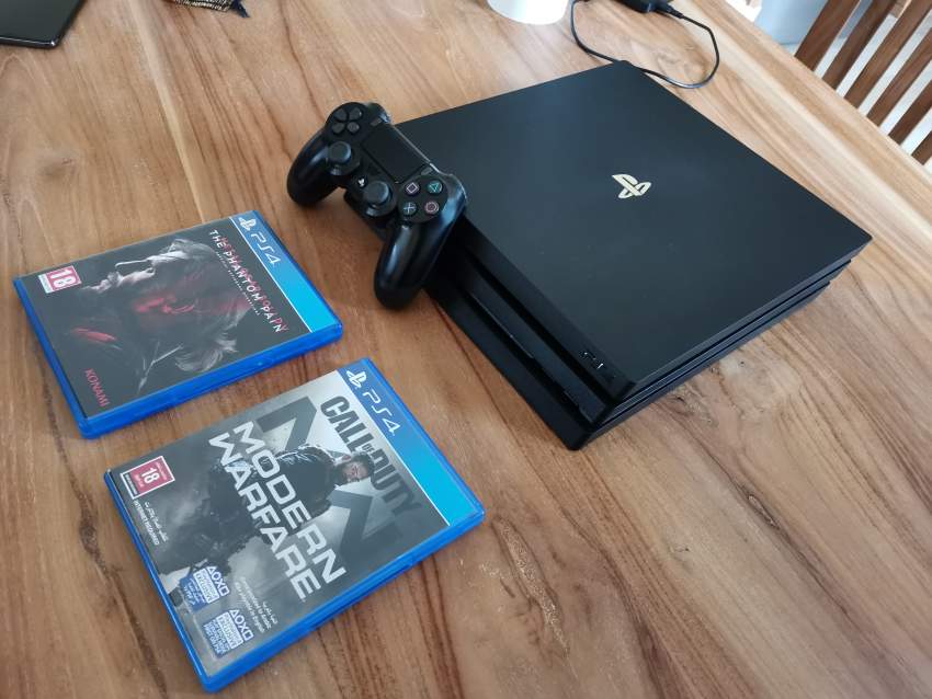 PS4 PRO - 1 TB - 2 GAMES - 1 - PlayStation 4 (PS4)  on Aster Vender