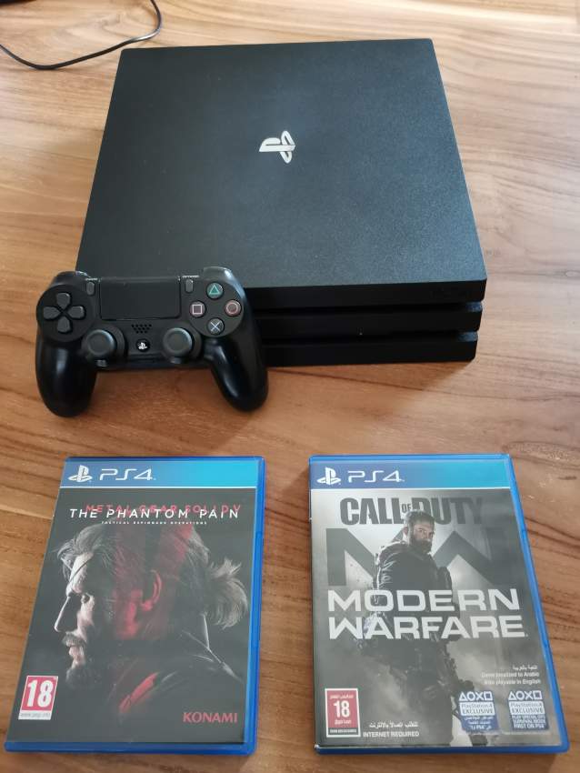 PS4 PRO - 1 TB - 2 GAMES on Aster Vender