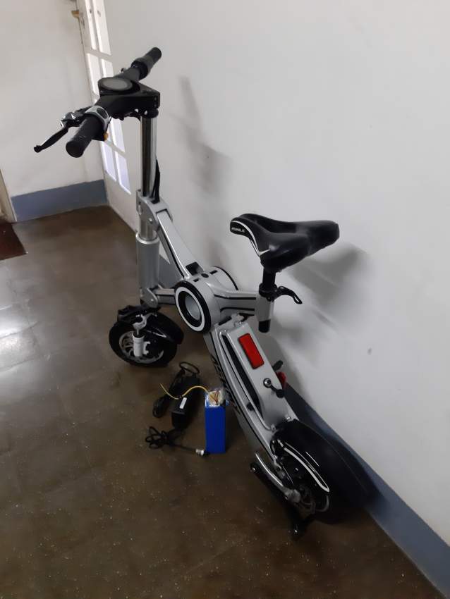 Scooter electrique  - 2 - Electric Scooter  on Aster Vender