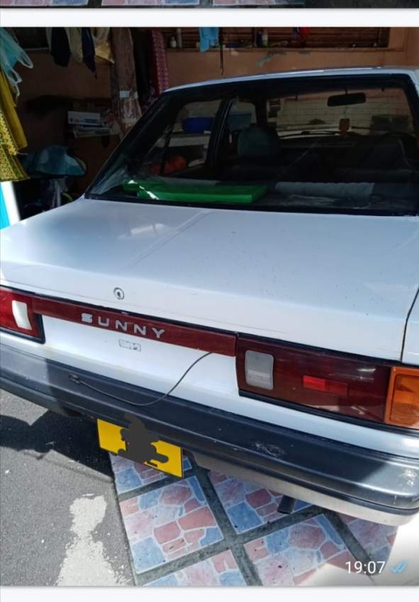 Nissan B12 on Aster Vender