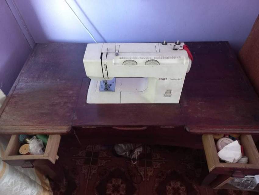 Table & Sewing machine at AsterVender